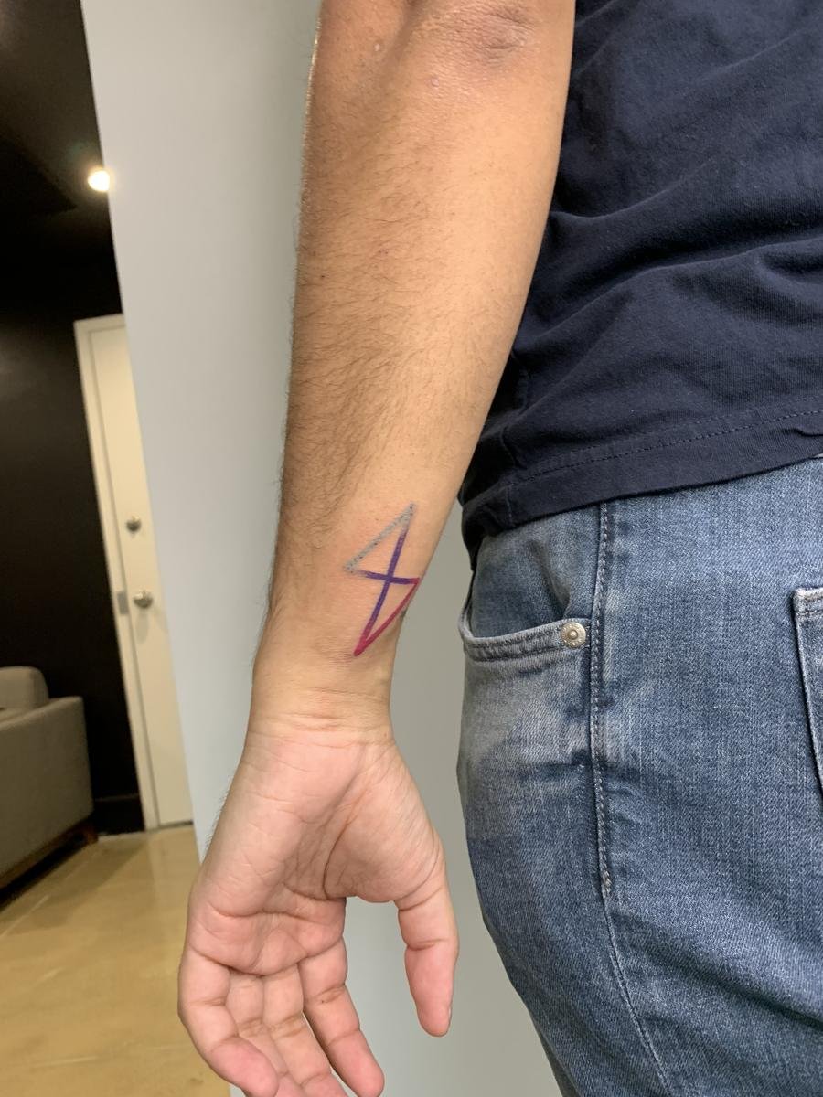 Purple Learn.co logo tattoo